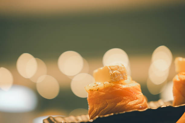 Catering food, cheese, olive and dry cherry.
