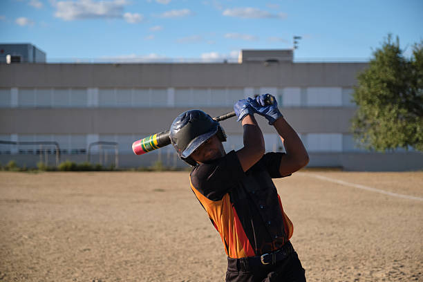istock Baseball batter swinging bat during intense game 2238250171
