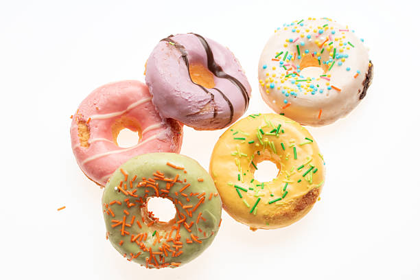istock Glazed doughnuts. Sweet doughnuts with sugar glaze on a white background 2238251701