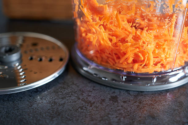 istock A food processor with grated carrots on the table. 2238253723