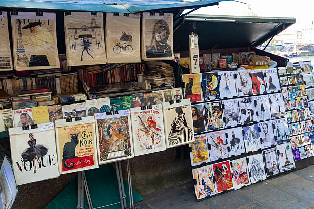 Paris, France - 30 May 2025 - the unique open-air bouquinistes, who are licensed second-hand booksellers with green boxes along the quays of the river Seine in downtown Paris. The perfect place to find unique copies of book and prints or maybe a nice souvenir.