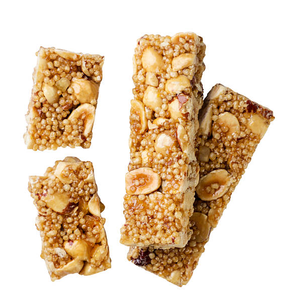 istock Granola bars with nuts cut out on a white. Top view 2238264740