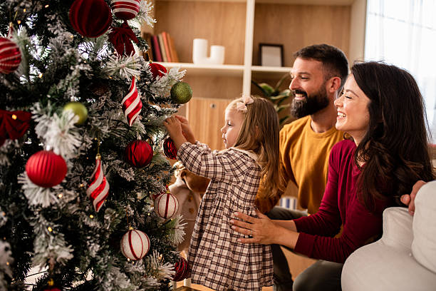 istock Family Christmas decorating joy 2238268277