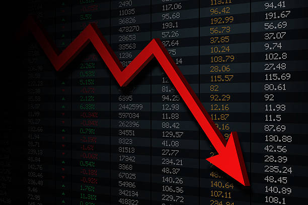 Market and trading concept with perspective view on digital graphic falling red arrow