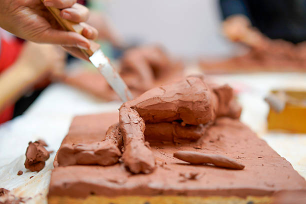 istock Teacher teacinhg in sculpting workshop 2238268882