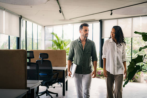 istock Group of young multi-ethnic startup business team collaborating on project in modern office 2238268994