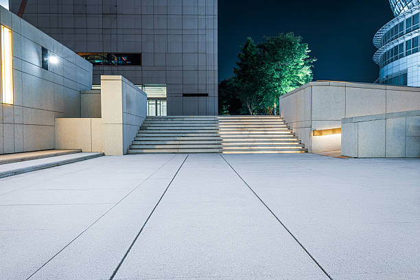 istock Empty square and modern office building in a city park at night. 2238269069