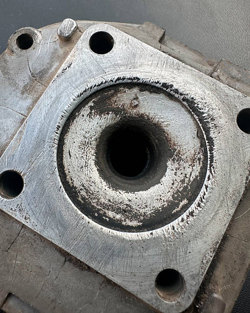 istock a scratched head of a two stroke scooter piston cylinder under the gasket 2238271491