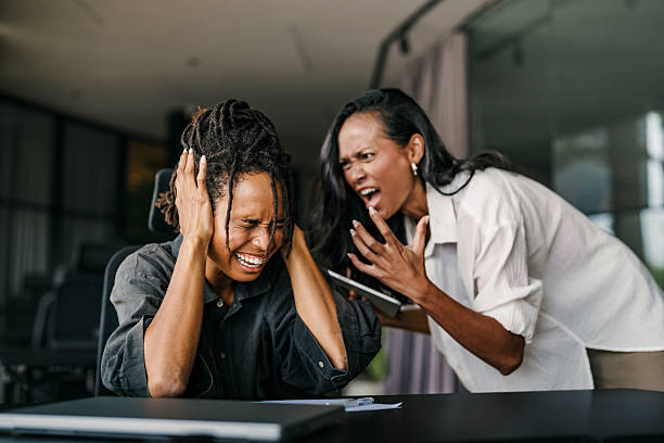istock Stressful work environment, overtime. Frustrated boss yelling at his subordinate in the office 2238272066