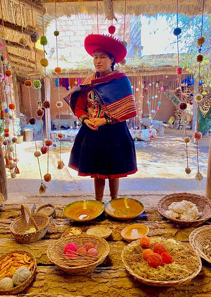 A Peruvian woman in traditional dress teaches tourists the art of Andean craft. Among wool threads, handlooms, and natural dyes, she shares more than just technique — she transmits stories, knowledge, and the spirit of her culture. In teaching, she strengthens her people’s identity and builds bridges between different worlds, connecting the ancestral to the present.