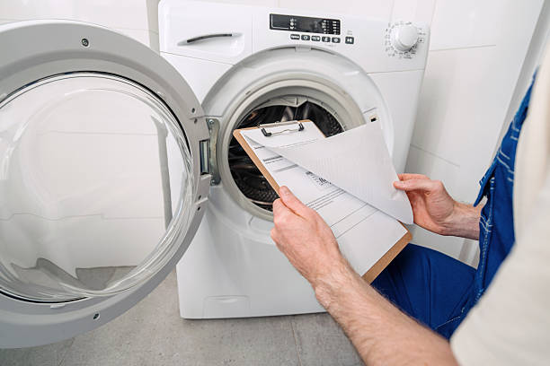 istock Repairing washing machine at home with professional maintenance service 2238281069