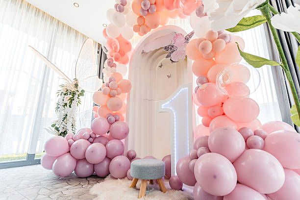 Outstanding white christmas ball Ornaments floating on pink Luxury chair with pastel pink background 3d rendering. 3d illustration minimal style christmas and happy new year concept.