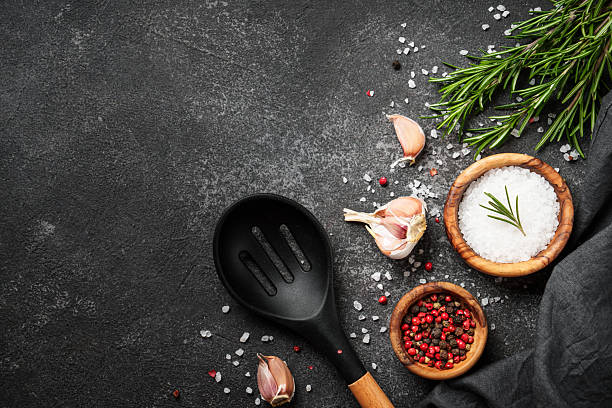 istock Spices and herbs at black top view. 2238282971