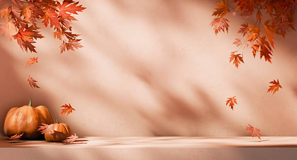 istock Thanksgiving background with autumn leaves and orange pumpkin on empty table. Fall season product podium display mockup. Home interior showroom with maple leaves and sunlight. 2238284743