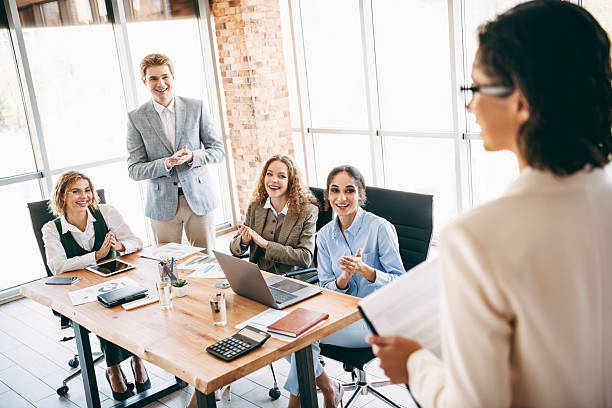istock Business professionals collaborating in a modern office during a dynamic meeting session involving teamwork and strategy discussions 2238291898