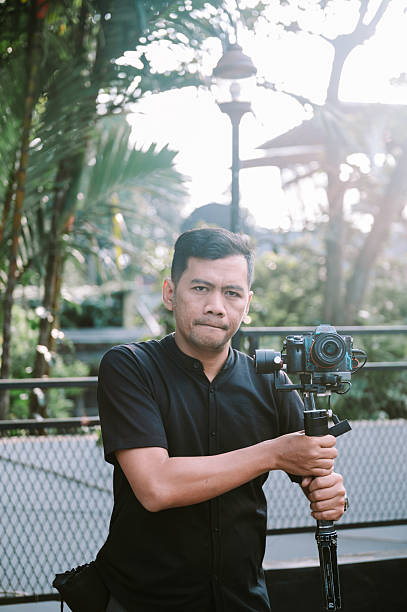 istock Videographer Working with Camera Gimbal System Outdoors 2238293074