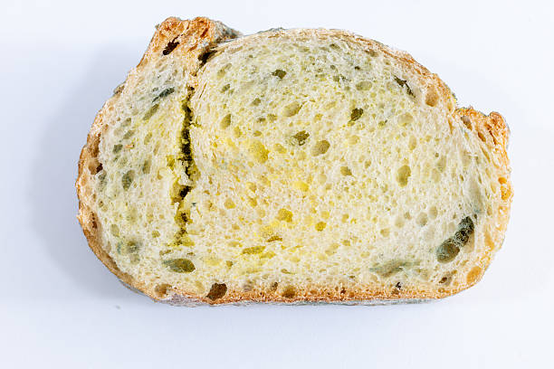 istock Close-up of Moldy bread on cutting board 2238299950