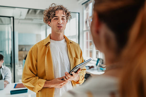 istock Young professionals collaborate effectively in a modern office environment during a team meeting 2238307699