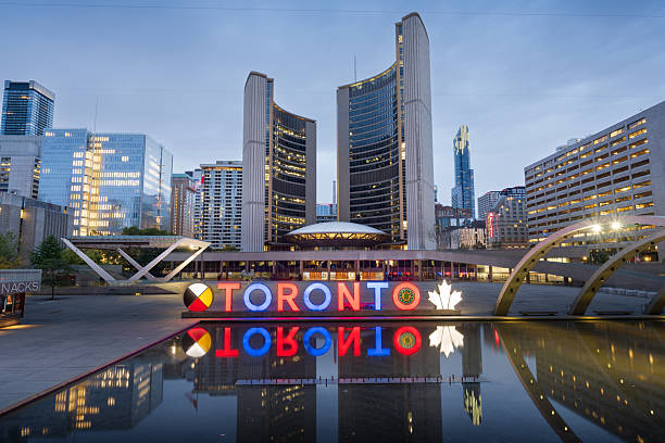 Tourists are enjoying Nuit Blanche at City Hall - Nathan Phillips Square in Toronto,Canada (a sleepless night).
