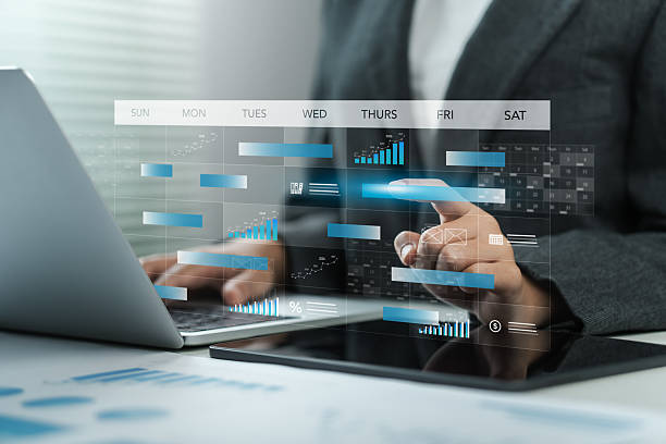 istock Businessmen use pen marks on the virtual screen calendar, Time management and scheduling concept. Business Planning Calendar Agenda work schedule, plan, goal, calendar 2238312668