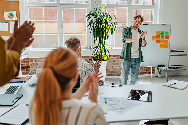 istock Young professionals engaged in a productive meeting in a modern office setting promoting teamwork and collaboration 2238312979