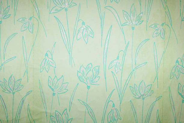 istock Old wallpaper on the wall. Old wallpaper for texture or background. 2238317404