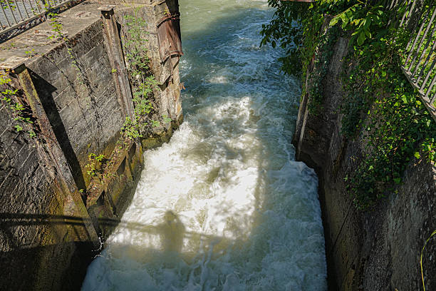 istock River water rushing through concrete canal 2238317427