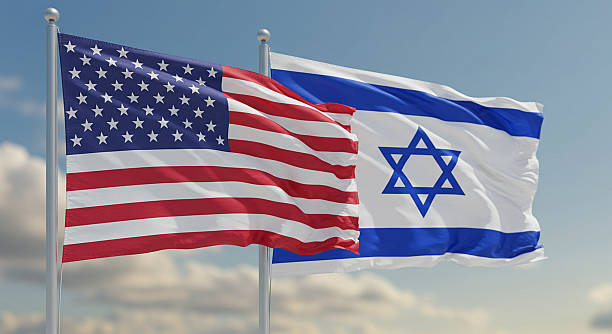 US and Israeli flags against the sky