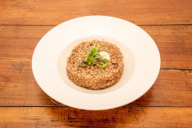 istock Sticky rice is a preparation of rice with an intermediate cooking point, between dry and brothy rice 2238319152