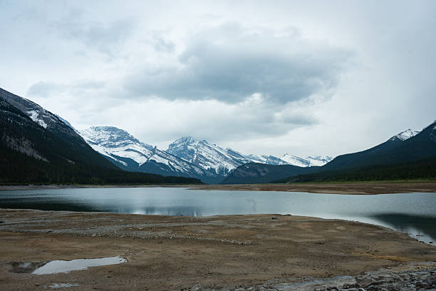Scenic mountainscape featuring a still lake. Spray Lake, Kananaskis