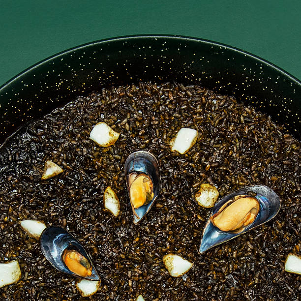 Black paella: Squid ink and black rice, a visually and tastefully striking dish