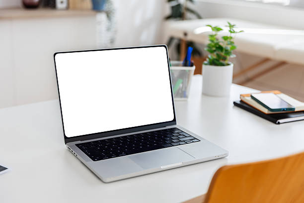 istock Laptop with blank screen on desk in doctor's office 2238326416