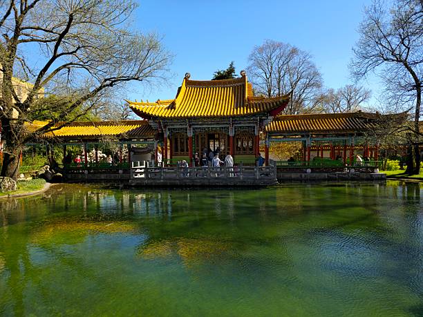 The Chinese Garden is a Chinese garden in the Swiss city of Zürich. It is a gift from Zürich's Chinese partner town Kunming, dedicated to the Three Friends of Winter. The image shoes the garden with a beautiful pond, captured during spring season.