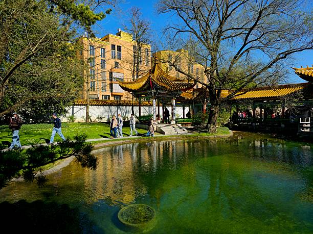 The Chinese Garden is a Chinese garden in the Swiss city of Zürich. It is a gift from Zürich's Chinese partner town Kunming, dedicated to the Three Friends of Winter. The image shoes the garden with a beautiful pond, captured during spring season.
