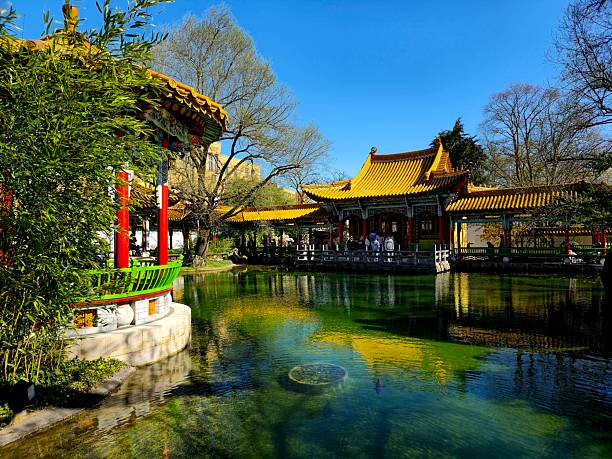 The Chinese Garden is a Chinese garden in the Swiss city of Zürich. It is a gift from Zürich's Chinese partner town Kunming, dedicated to the Three Friends of Winter. The image shoes the garden with a beautiful pond, captured during spring season.