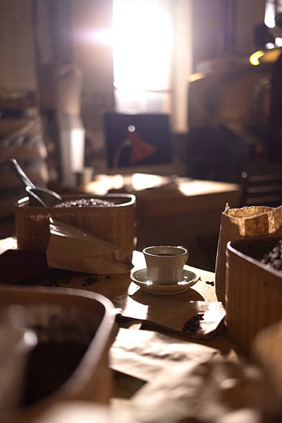 istock Cozy Coffee Cup On Wooden Table In A Rustic Workshop With Beans And Soft Sunlight 2238334432