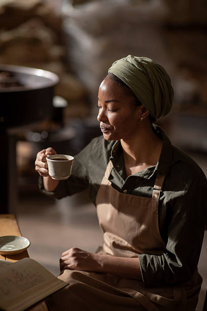 istock Barista Enjoying a Warm Drink in a Rustic Coffee Shop 2238334497