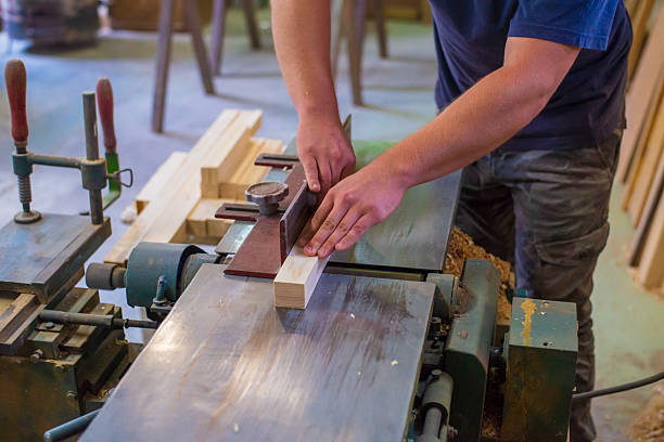 istock Young carpenter making furniture in his workshop 2238336533