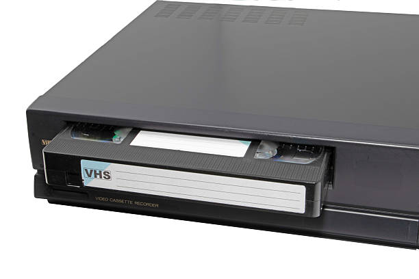 istock Close-up of a video cassette recorder player, isolated on white background 2238337607