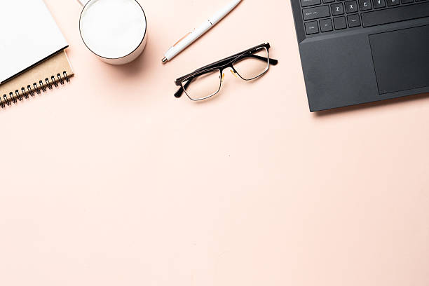 istock Autumn office desk. Laptop, notebook, coffee cup and yellow leaves. 2238338376