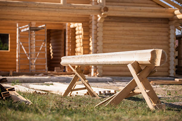 Shot of a construction site of a wooden log house.