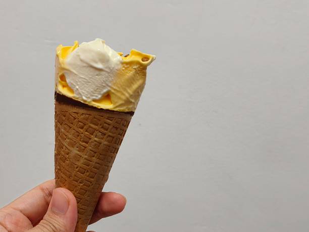 istock Hand Holding an Ice Cream Cone 2238342195