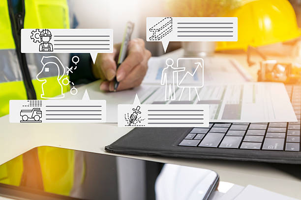 istock Engineers discuss and plan for cost control of construction materials. The use of drilling tools and transportation of materials in the construction area requires planning and work guidelines. 2238344860
