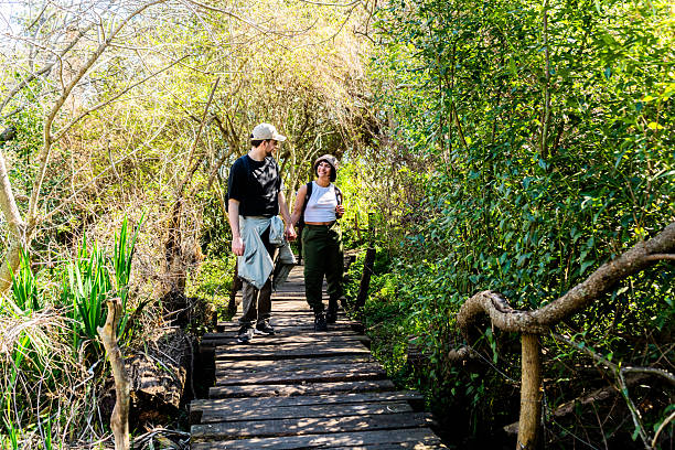 istock Young couple on a hike in the forest 2238352845