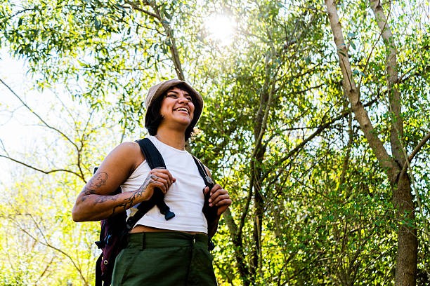 istock Young woman on a hike in the forest 2238352864