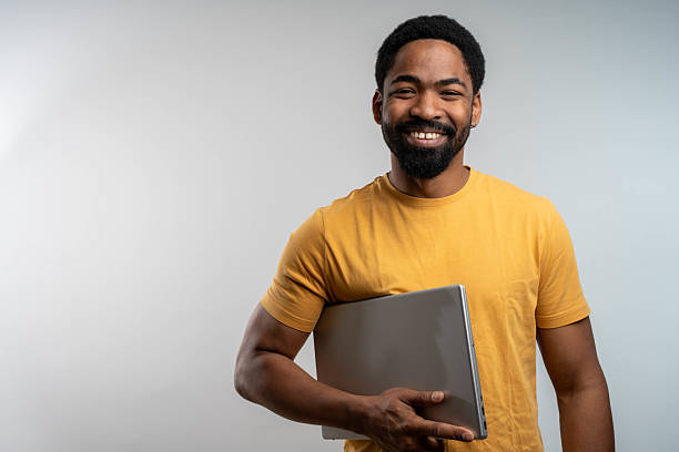 istock Portrait of confident young man 2238357975