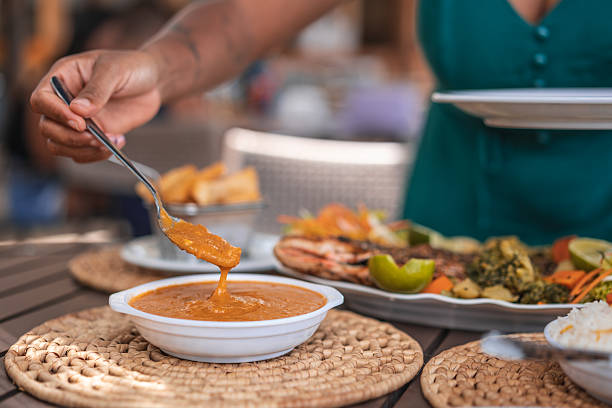 Afro tourist at a tropical Brazilian restaurant in Pernambuco, Brazil
