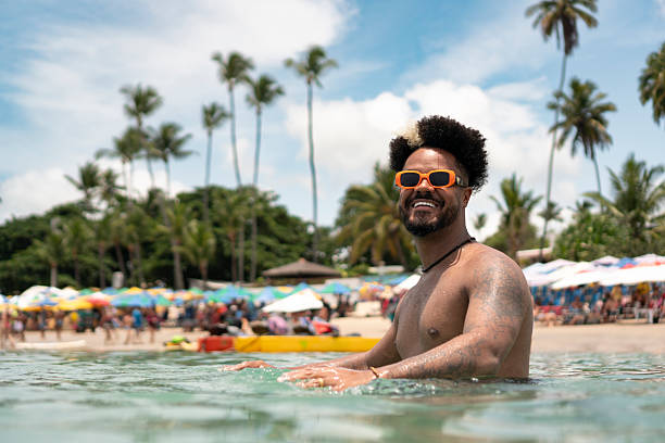 istock Afro man enjoying Porto de Galinhas beach 2238359129