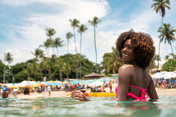 istock Afro tourist bathing on Porto de Galinhas beach 2238359136