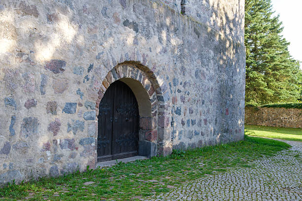 istock old stone gate at a old church 2238370162